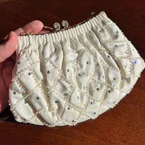 Antique white rhinestone clutch bag